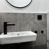 Hand-Waschbecken im 2023 neu gestalteten Gäste-WC in der Wohnung W6 im Gästehaus Christian-Westphal-Straße 60